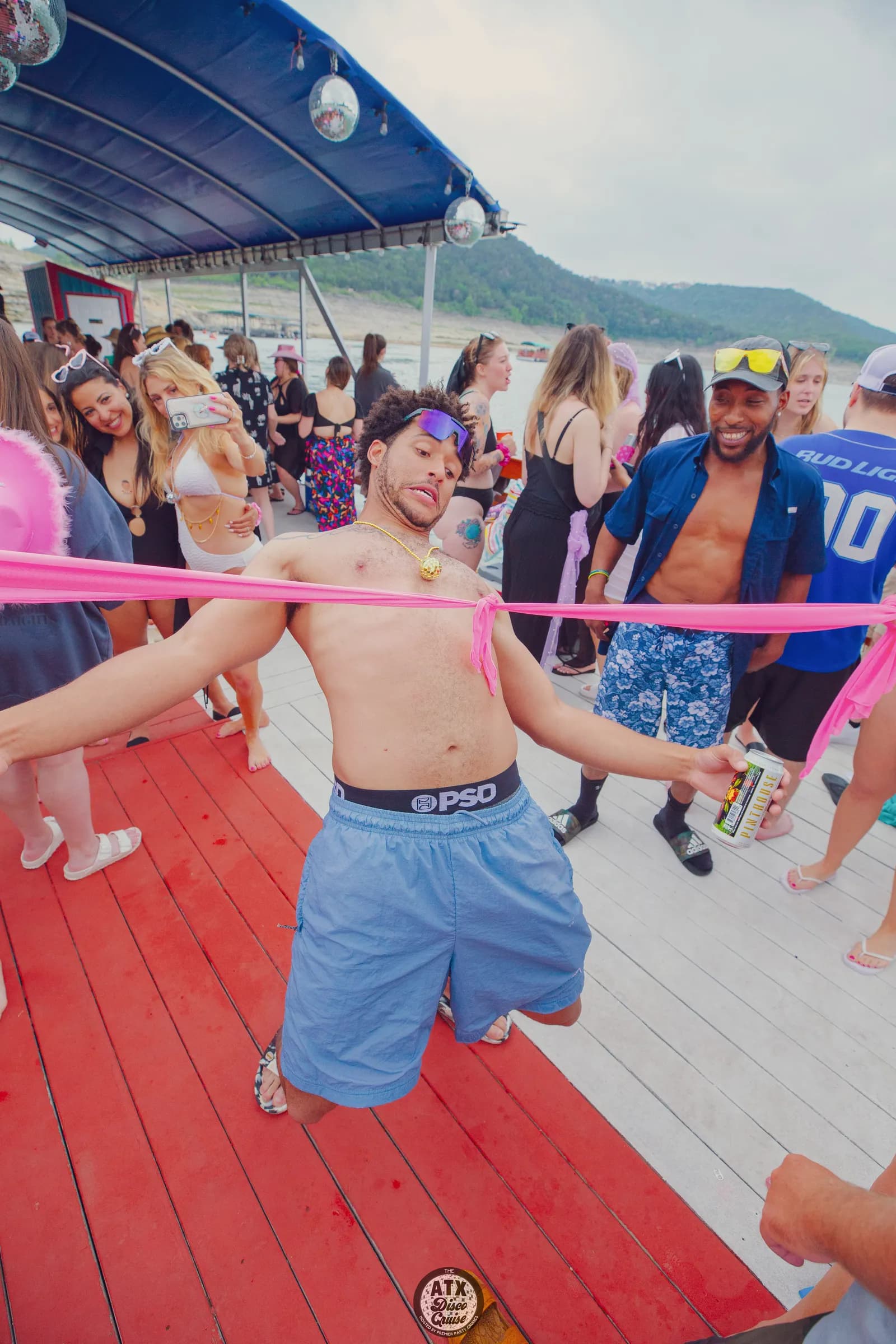Guests dancing on a Premier party cruise